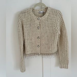 Cream sweater with dripping jewels